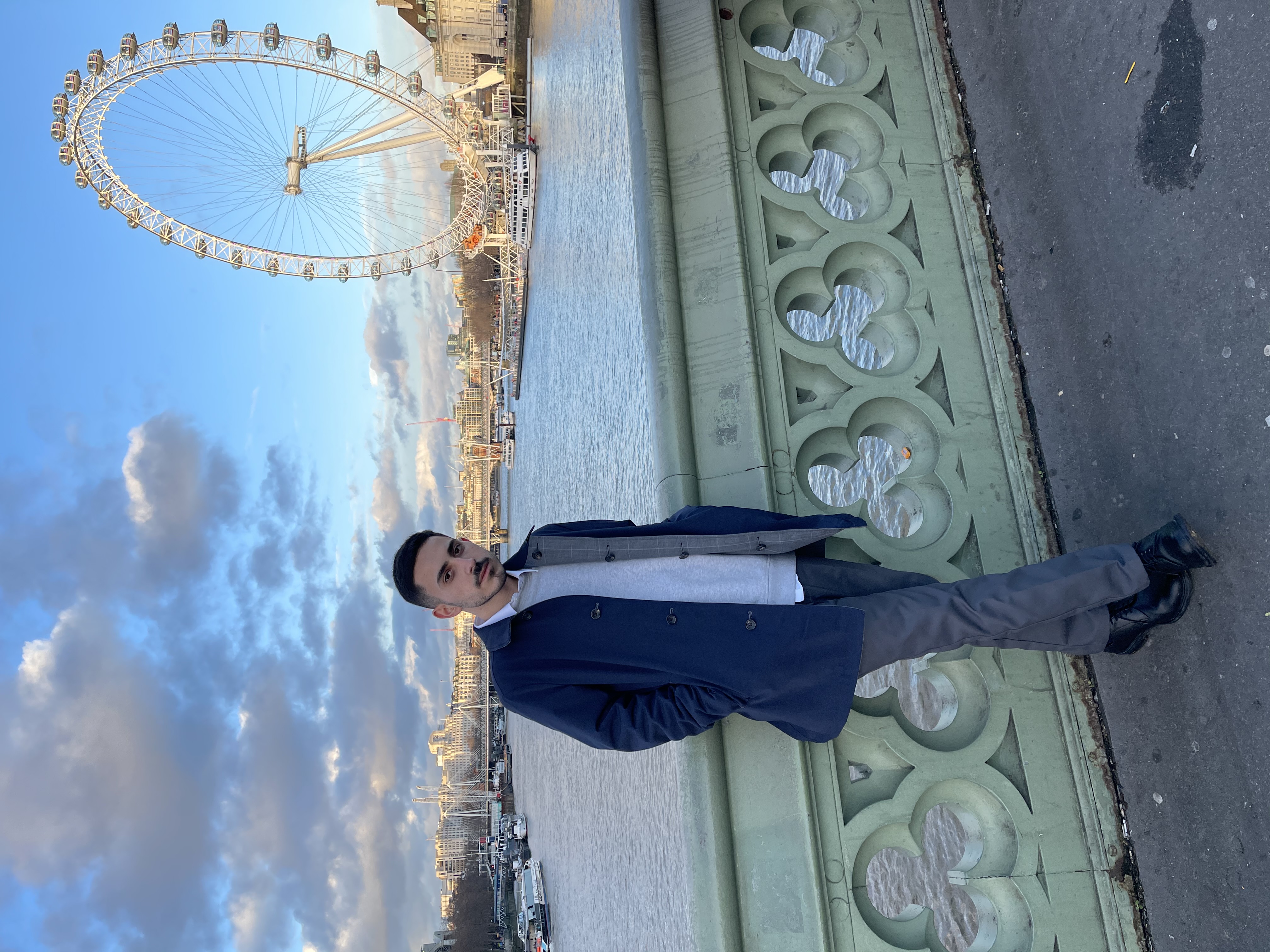 Tshuva Zazon on Westminster Bridge with the London Eye behind him